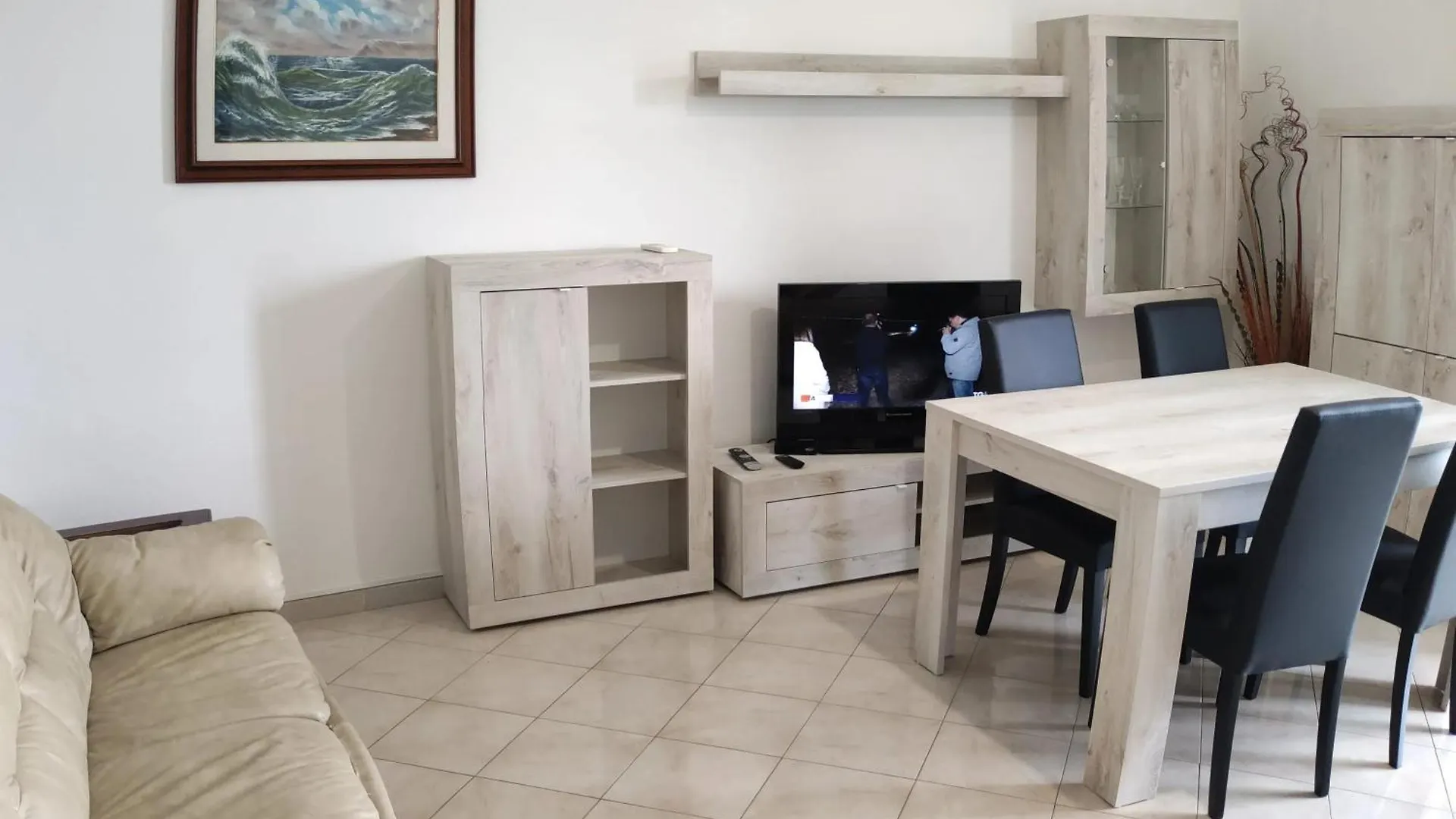 Seaside Haven: Porto Santo Stefano Apartment with Beach Access